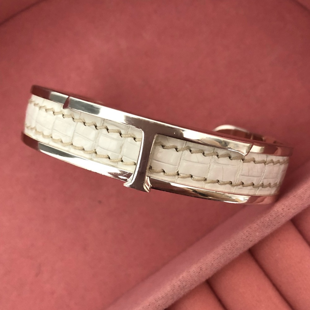 Tod’s silver metal embossed leather logo bracelet